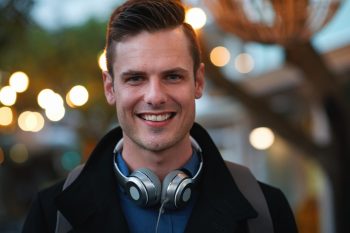 Portrait,Attractive,Man,Smiling,Confident,Male,In,City,Evening,With
